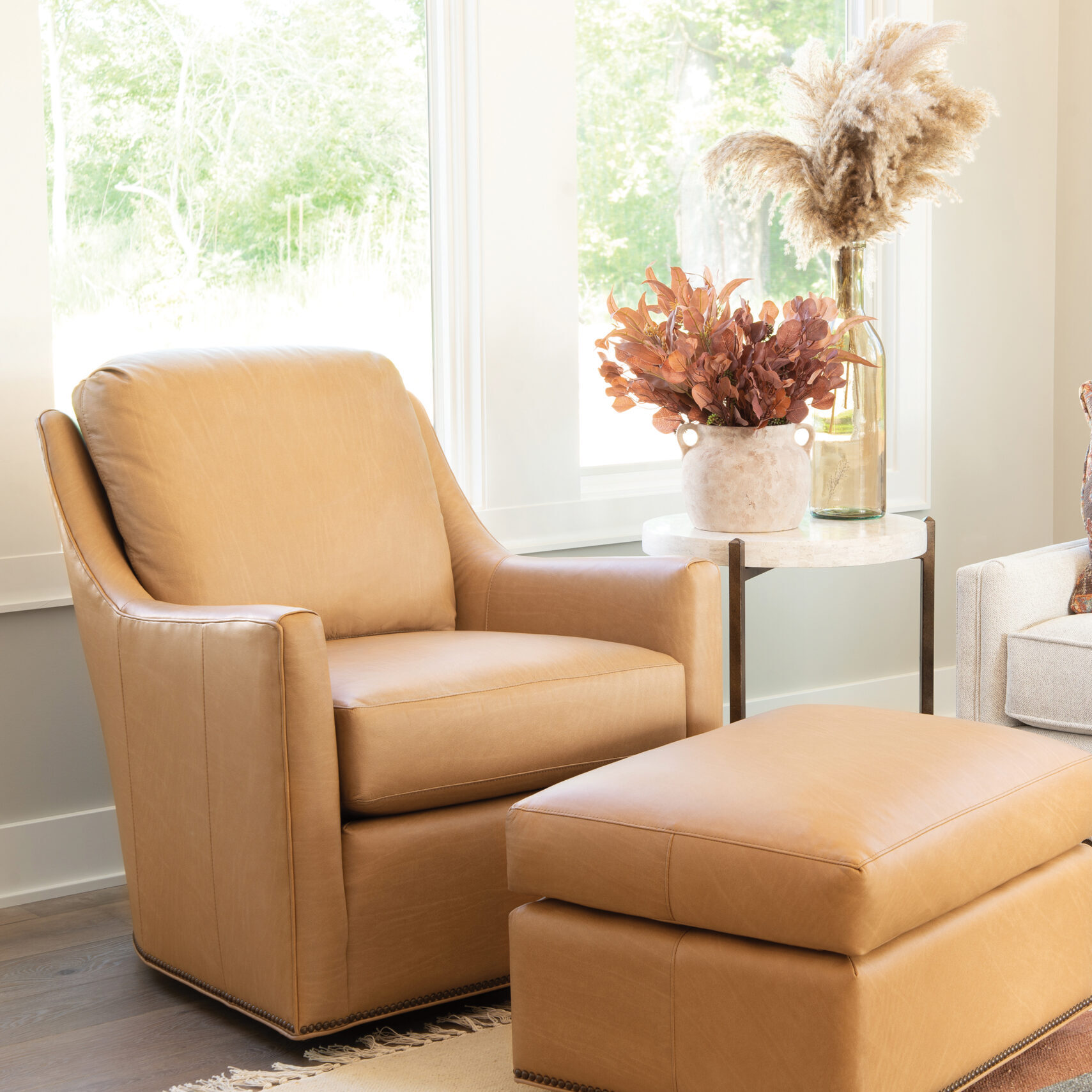 fabric sofa and leather chair