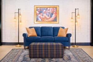 Blue Sofa with Plaid Ottoman