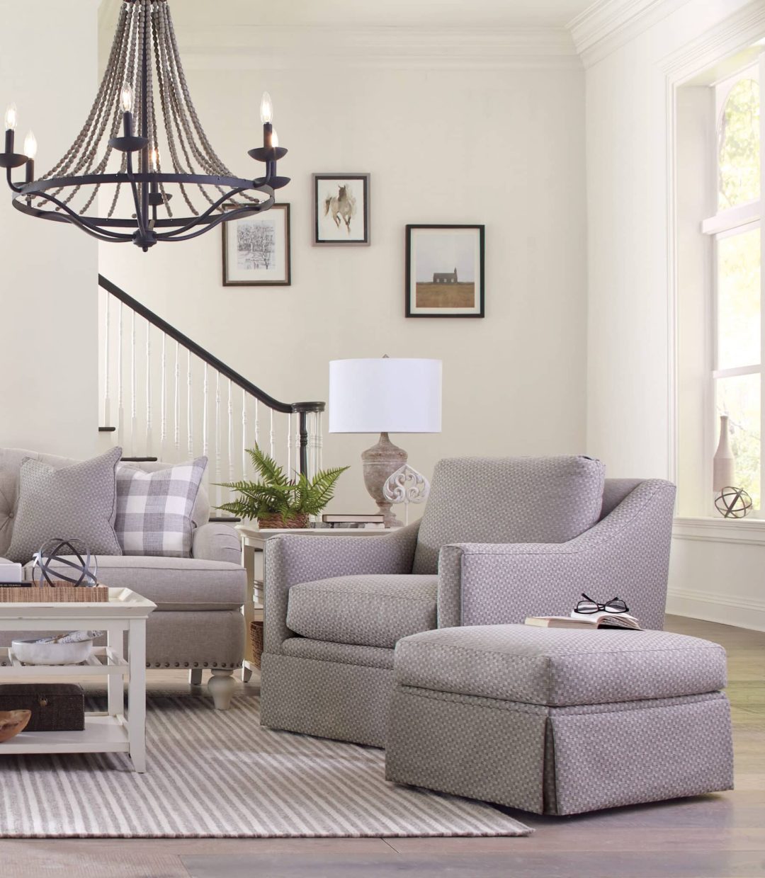 Gray Swivel Chair with Skirted Ottoman